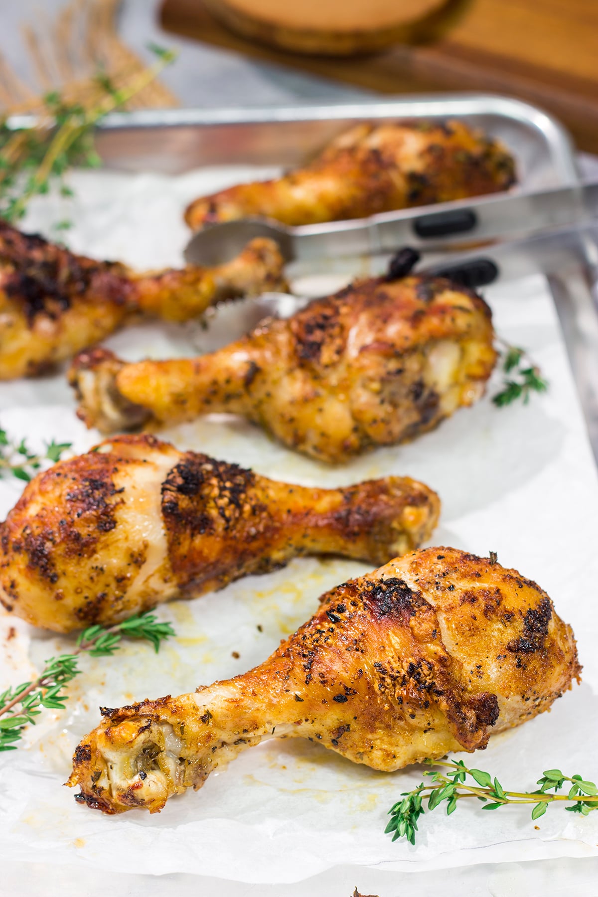 With only 10-minutes of prep time, these Crispy Baked Chicken Drumsticks make for an easy weeknight meal. They taste just like rotisserie chicken!