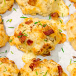 Want homemade biscuits for dinner? This easy Bacon Cheese Drop Biscuits recipe is packed with flavor! Whip up a batch today!