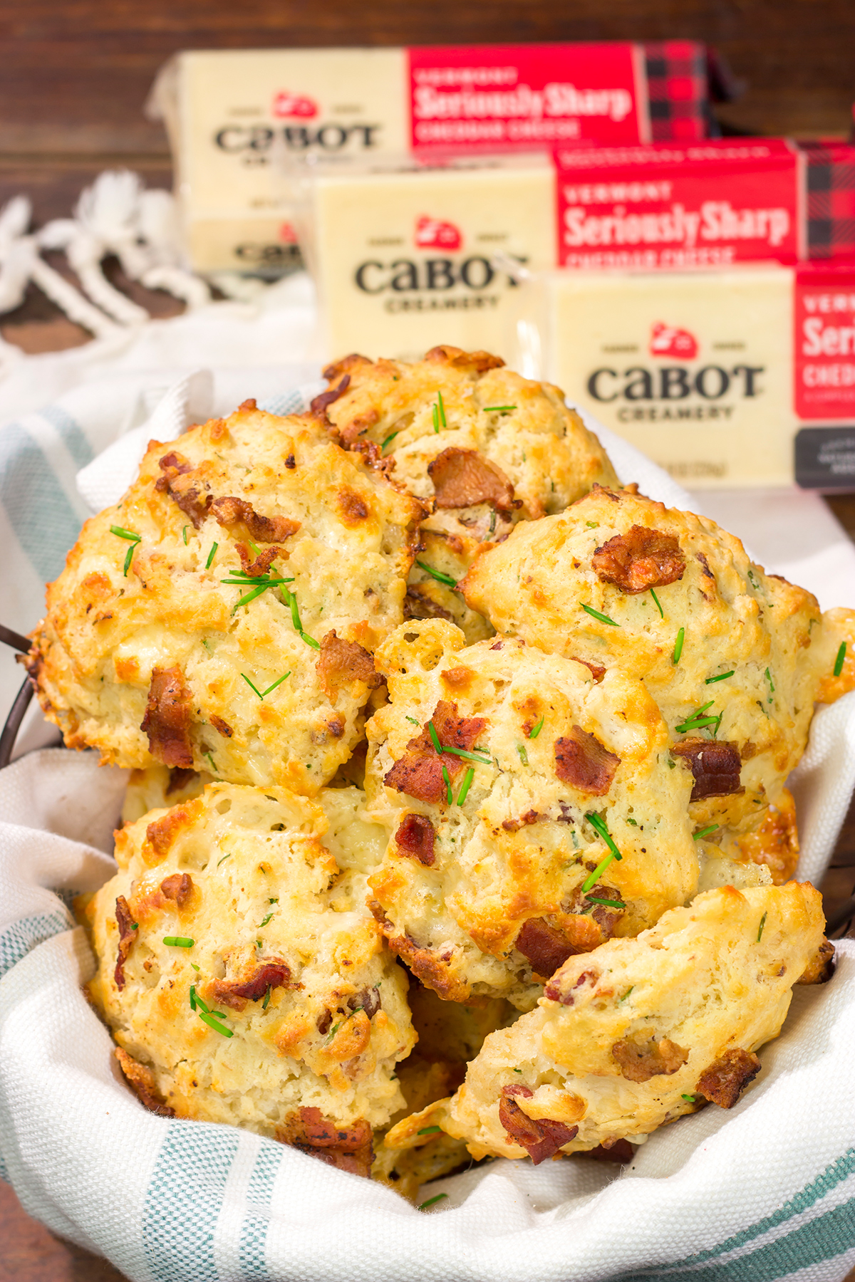 Want homemade biscuits for dinner? This easy Bacon Cheese Drop Biscuits recipe is packed with flavor! Whip up a batch today!