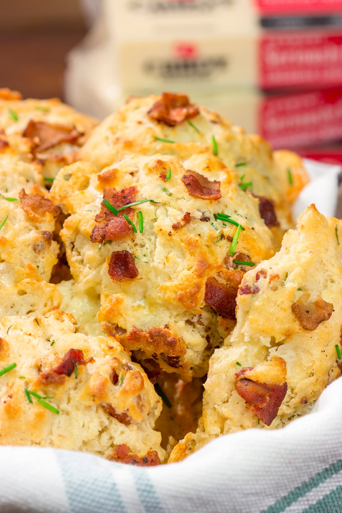 Want homemade biscuits for dinner? This easy Bacon Cheese Drop Biscuits recipe is packed with flavor! Whip up a batch today!