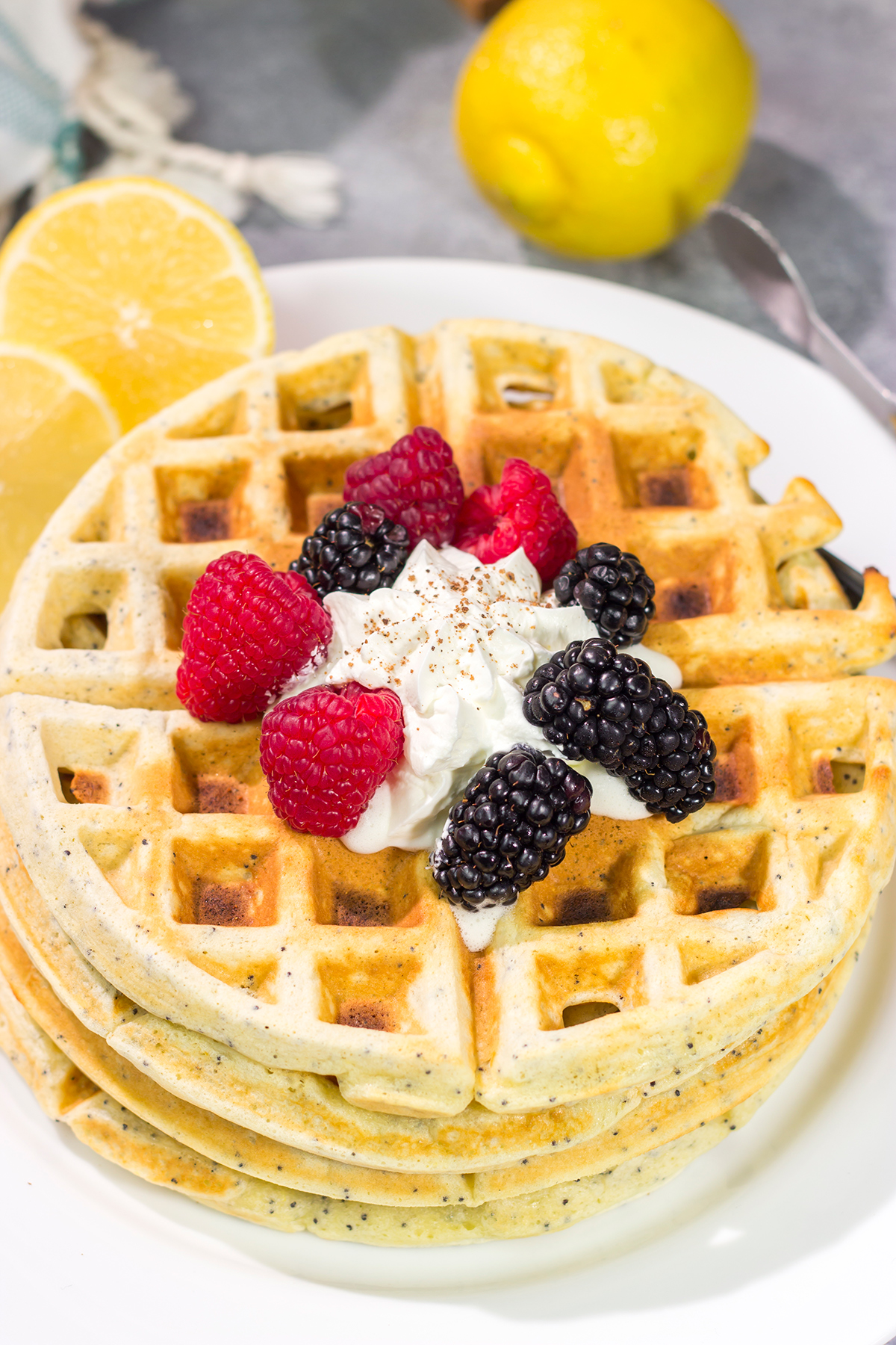 Put a bright, citrusy spin on breakfast with a batch of these Lemon Poppy Seed Waffles!