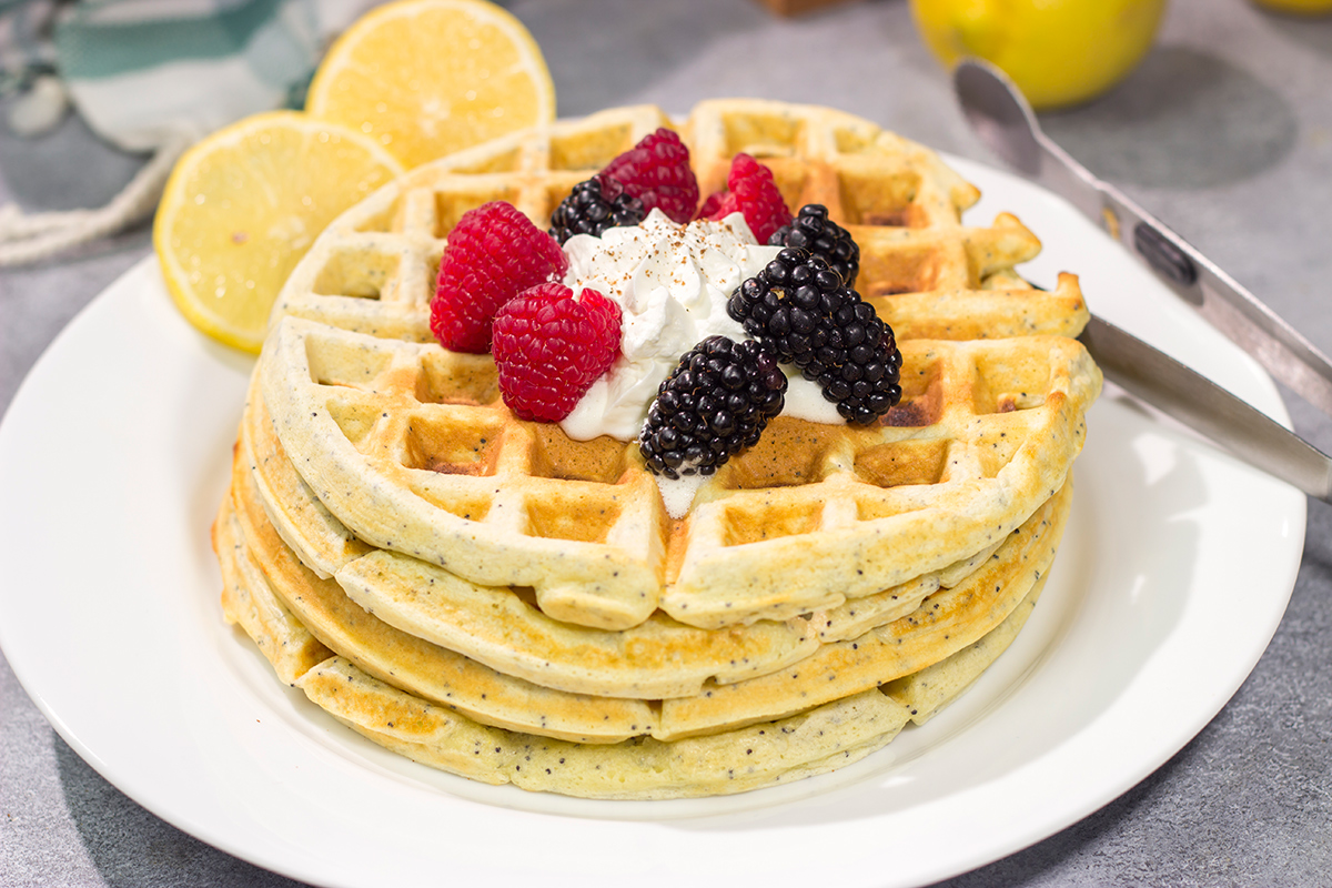 Put a bright, citrusy spin on breakfast with a batch of these Lemon Poppy Seed Waffles!