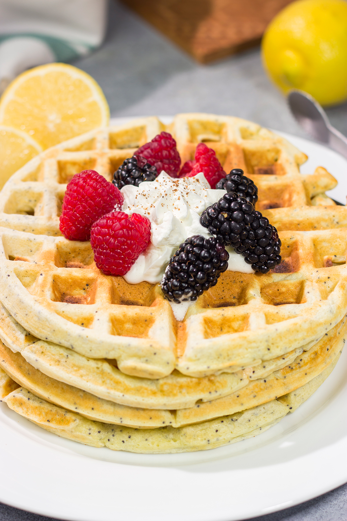 Put a bright, citrusy spin on breakfast with a batch of these Lemon Poppy Seed Waffles!