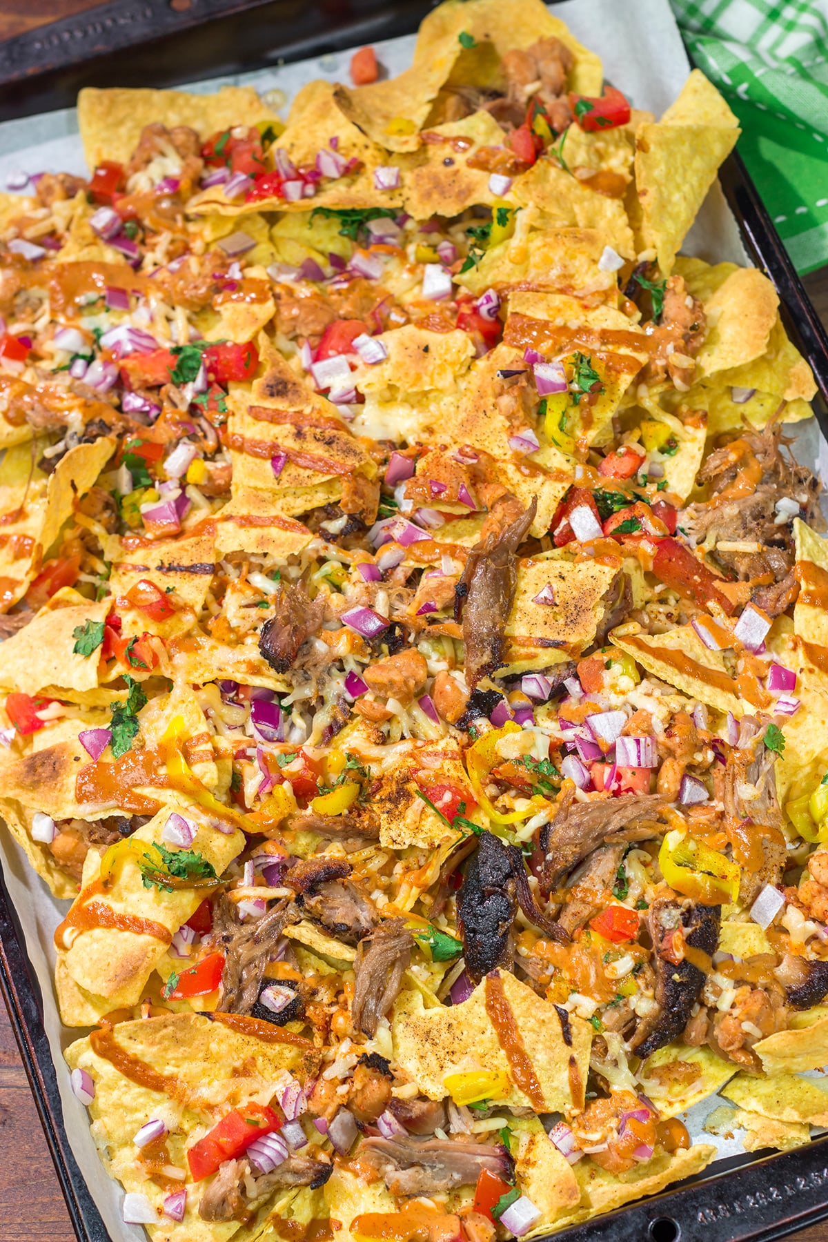 Turn those tortilla chips into a meal by adding smoked meat, BBQ sauce, cheese and all of your favorite toppings. These Loaded BBQ Nachos are a crowd favorite!