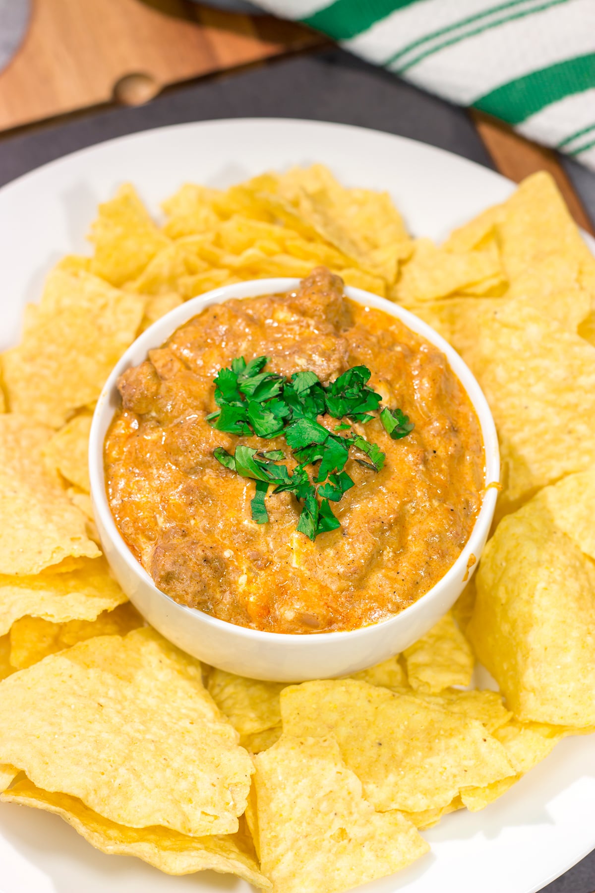 This easy Slow Cooker Cheesy Mexican Dip is packed with flavor! It's the perfect appetizer for watching games with friends.