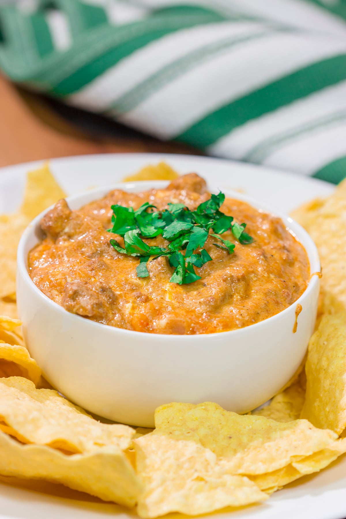 This easy Slow Cooker Cheesy Mexican Dip is packed with flavor! It's the perfect appetizer for watching games with friends.