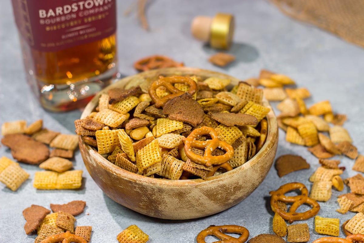 Give that homemade snack mix a makeover with this Bourbon Chex Mix! The whiskey adds a fun extra layer of flavor to this classic snack.