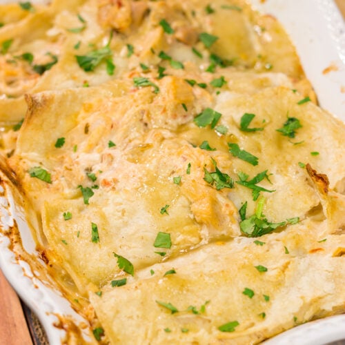 These Easy Chicken Enchiladas are baked in casserole form for a simple, delicious weeknight meal!