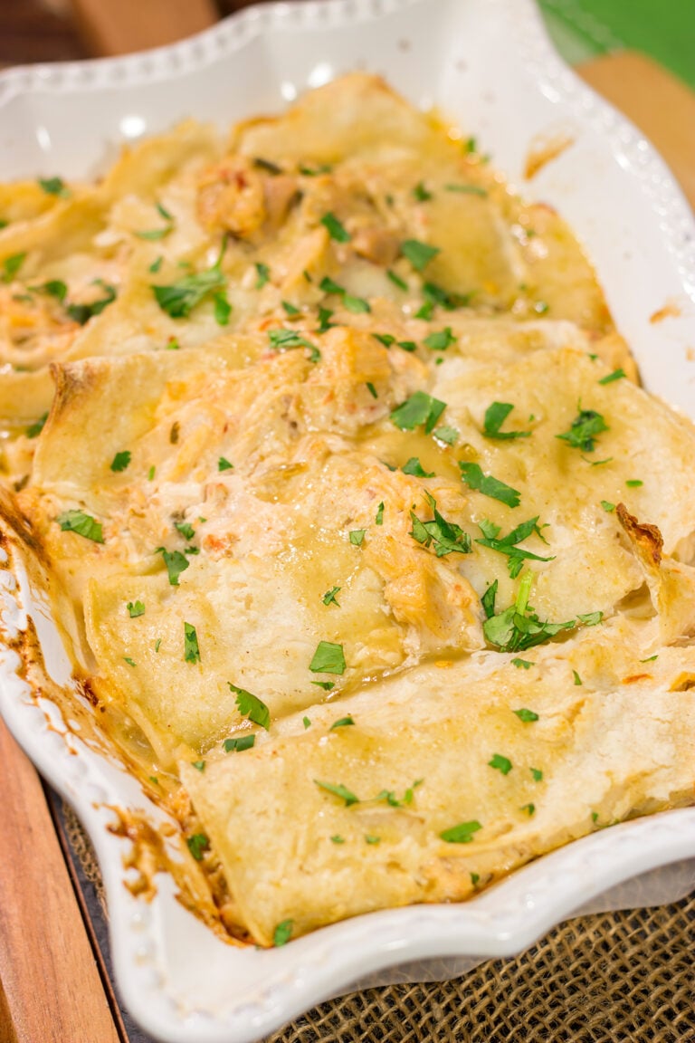 These Easy Chicken Enchiladas are baked in casserole form for a simple, delicious weeknight meal!