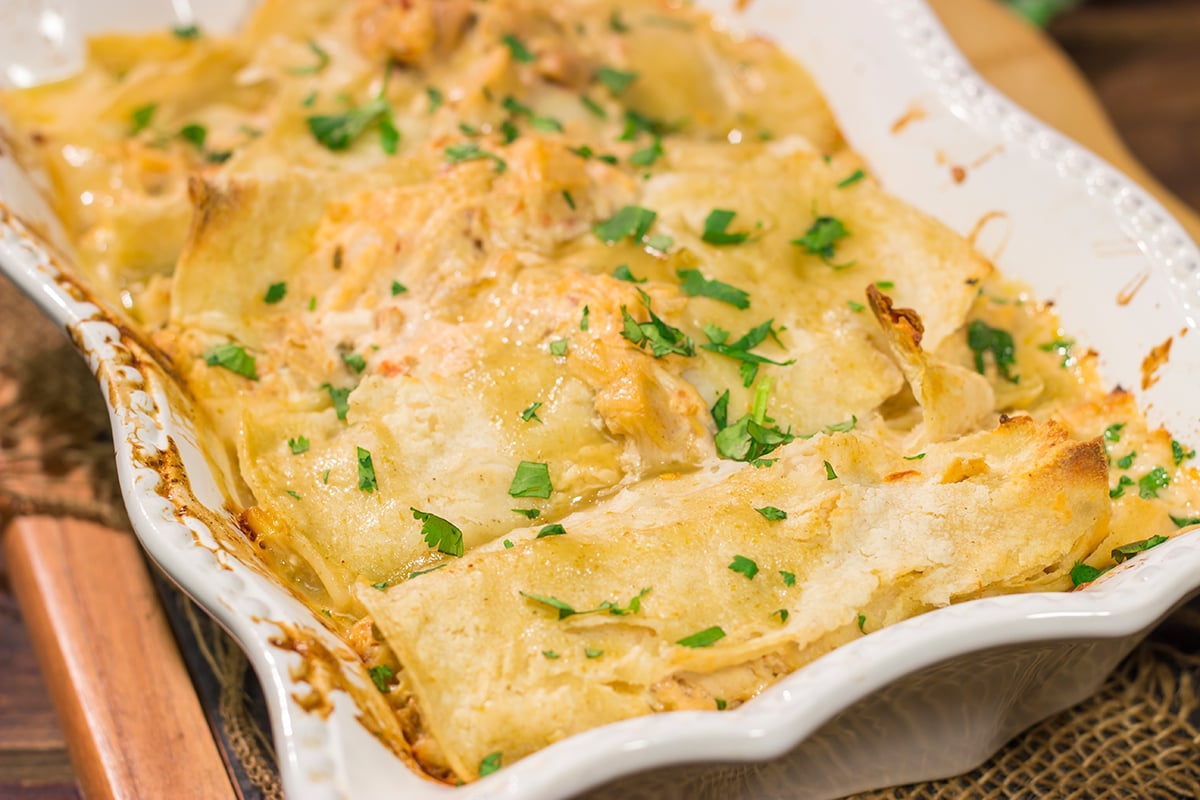 These Easy Chicken Enchiladas are baked in casserole form for a simple, delicious weeknight meal!