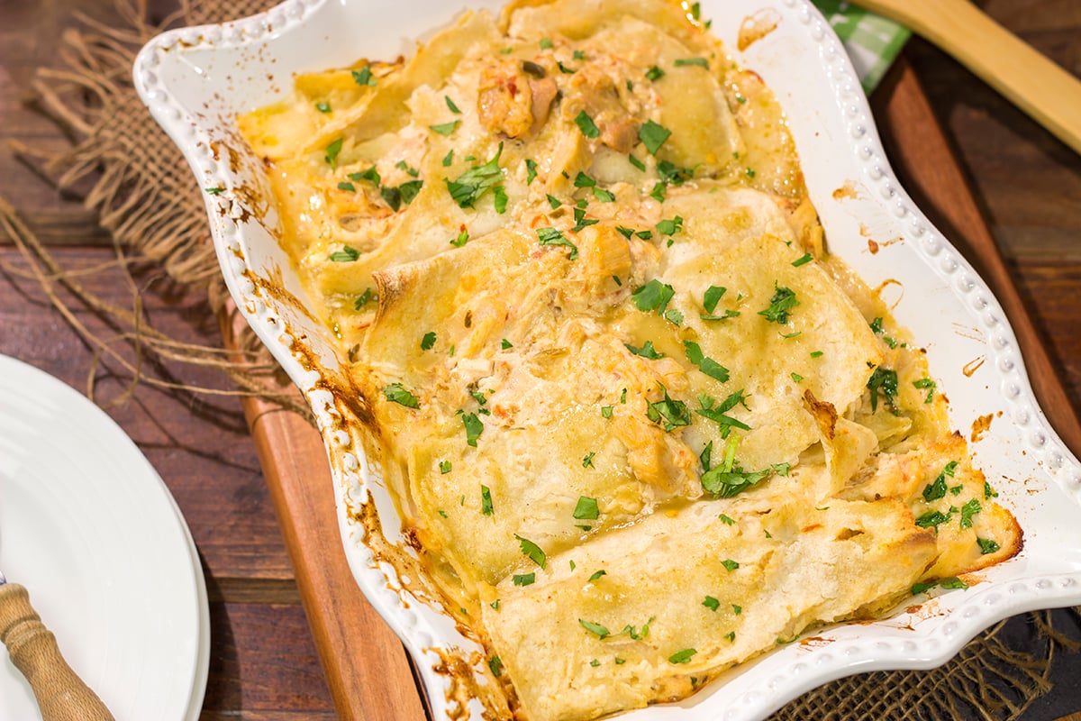 These Easy Chicken Enchiladas are baked in casserole form for a simple, delicious weeknight meal!