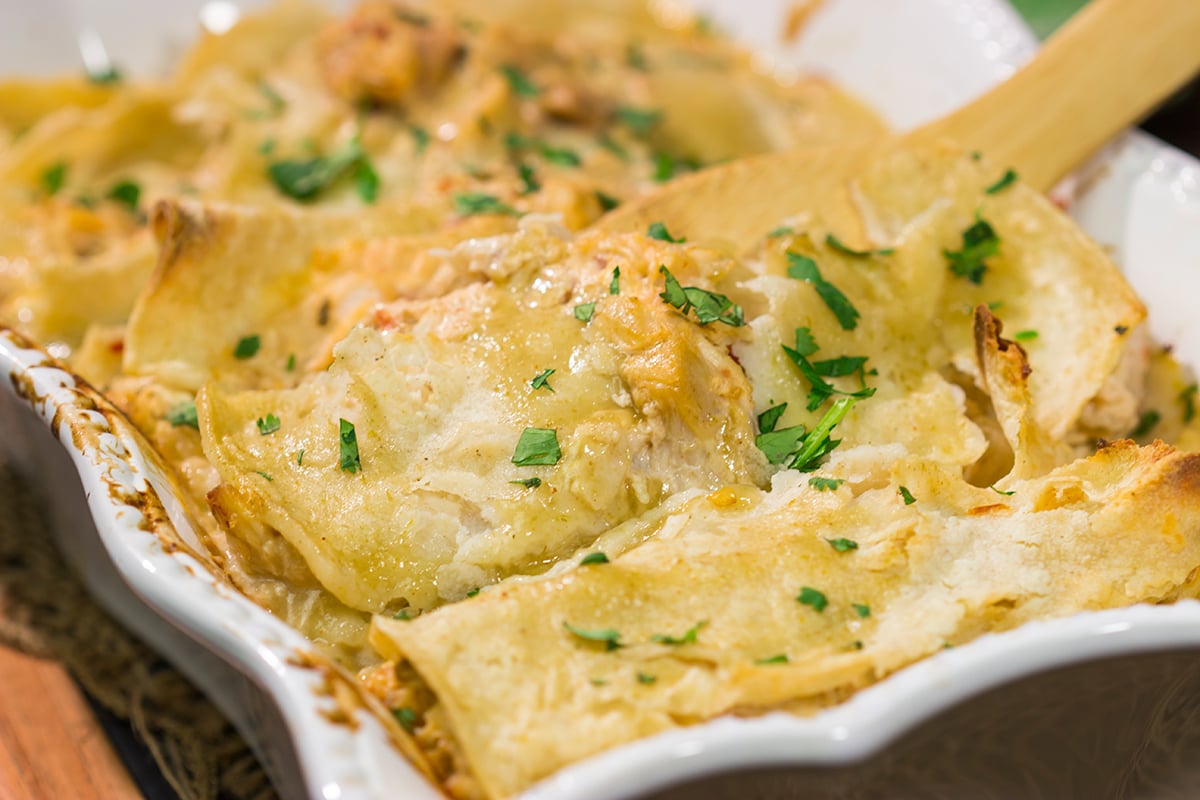 These Easy Chicken Enchiladas are baked in casserole form for a simple, delicious weeknight meal!