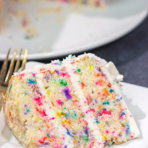 This light and fluffy Funfetti Layer Cake features a delicious vanilla cake with lots of sprinkles and a vanilla buttercream...with more sprinkles! It makes a great birthday cake...or for any other special occasion.