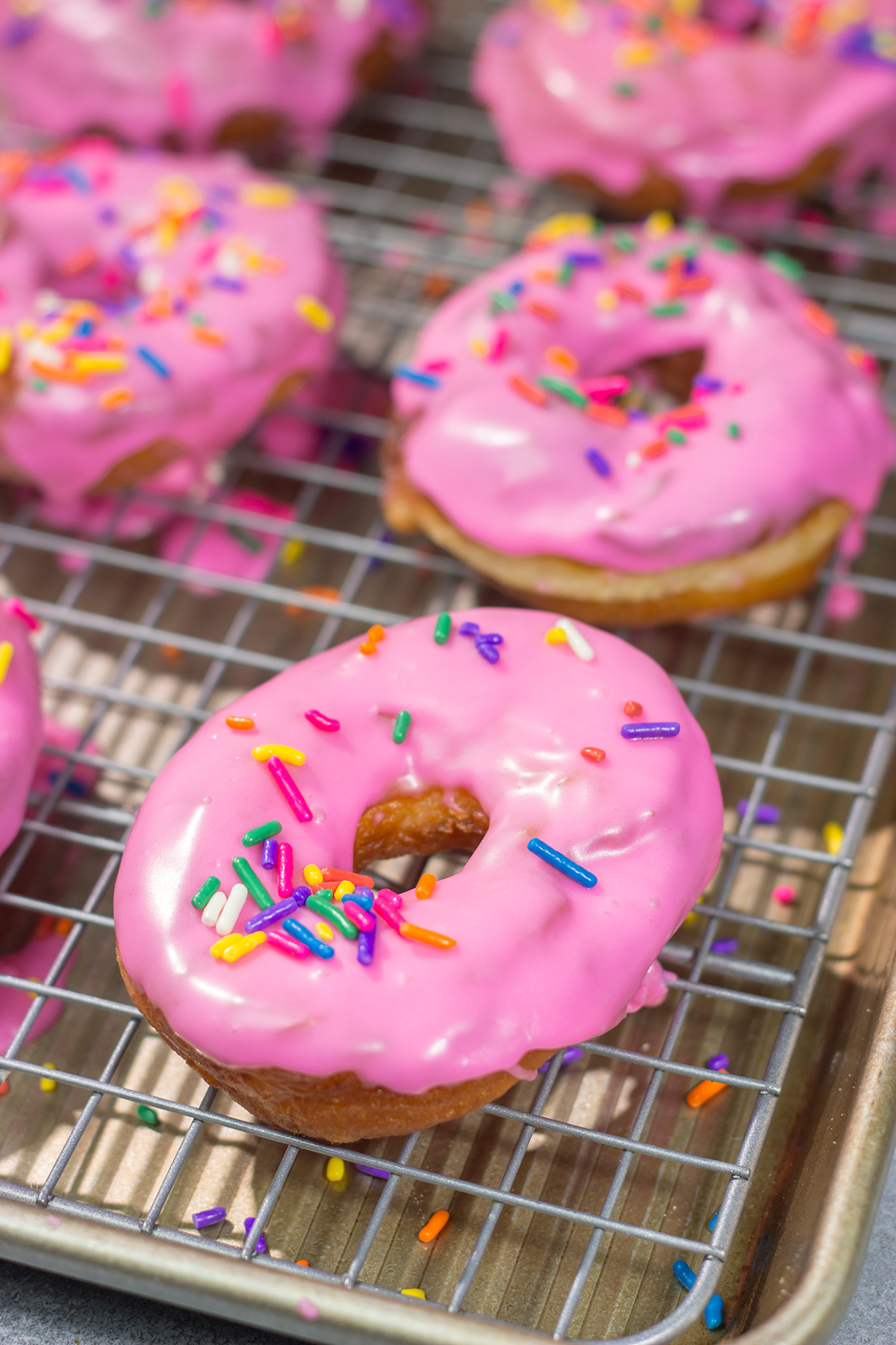 Fan of The Simpsons? Then whip up a batch of these Homer Simpson Donuts! These pink glazed doughnuts are fun...and delicious. D'oh!