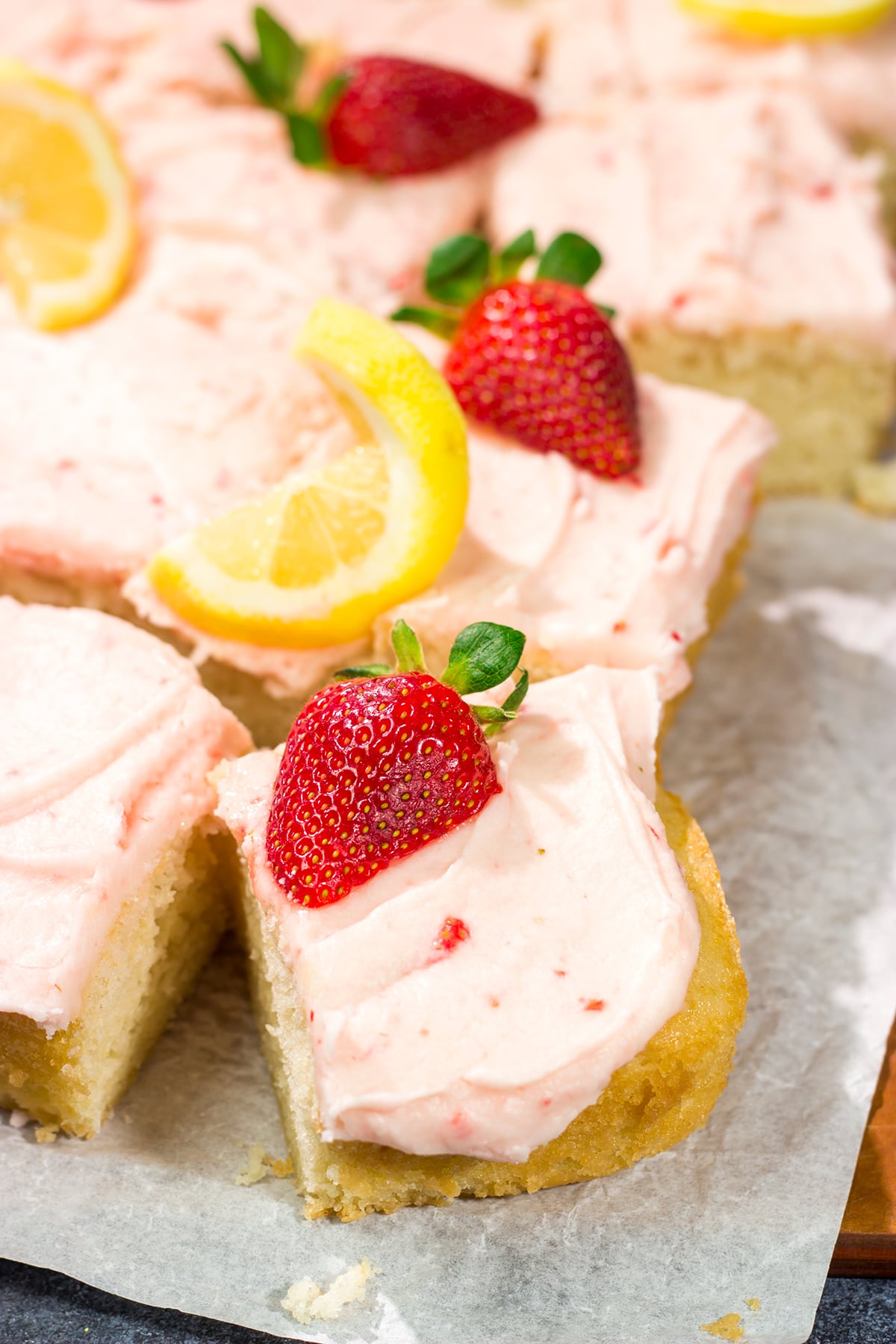 Celebrate warm weather season with this Lemon Strawberry Cake! This dessert features an eggless lemon cake topped with a luscious strawberry buttercream frosting.