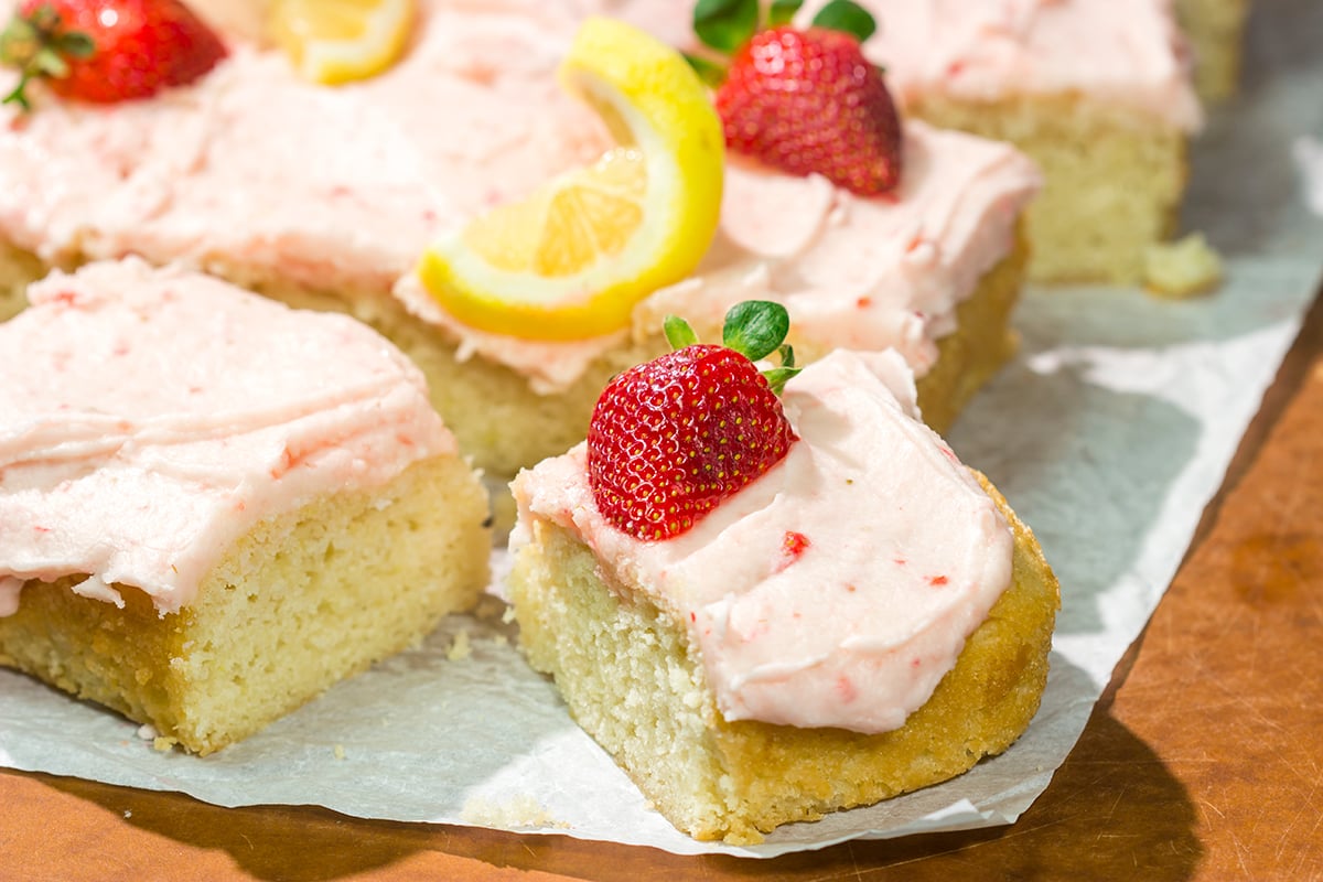 Celebrate warm weather season with this Lemon Strawberry Cake! This dessert features an eggless lemon cake topped with a luscious strawberry buttercream frosting.