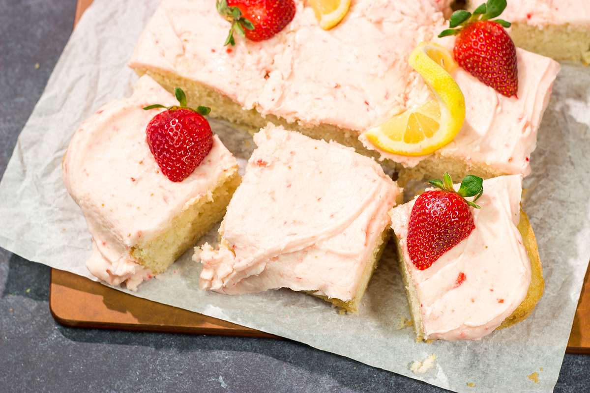 Celebrate warm weather season with this Lemon Strawberry Cake! This dessert features an eggless lemon cake topped with a luscious strawberry buttercream frosting.