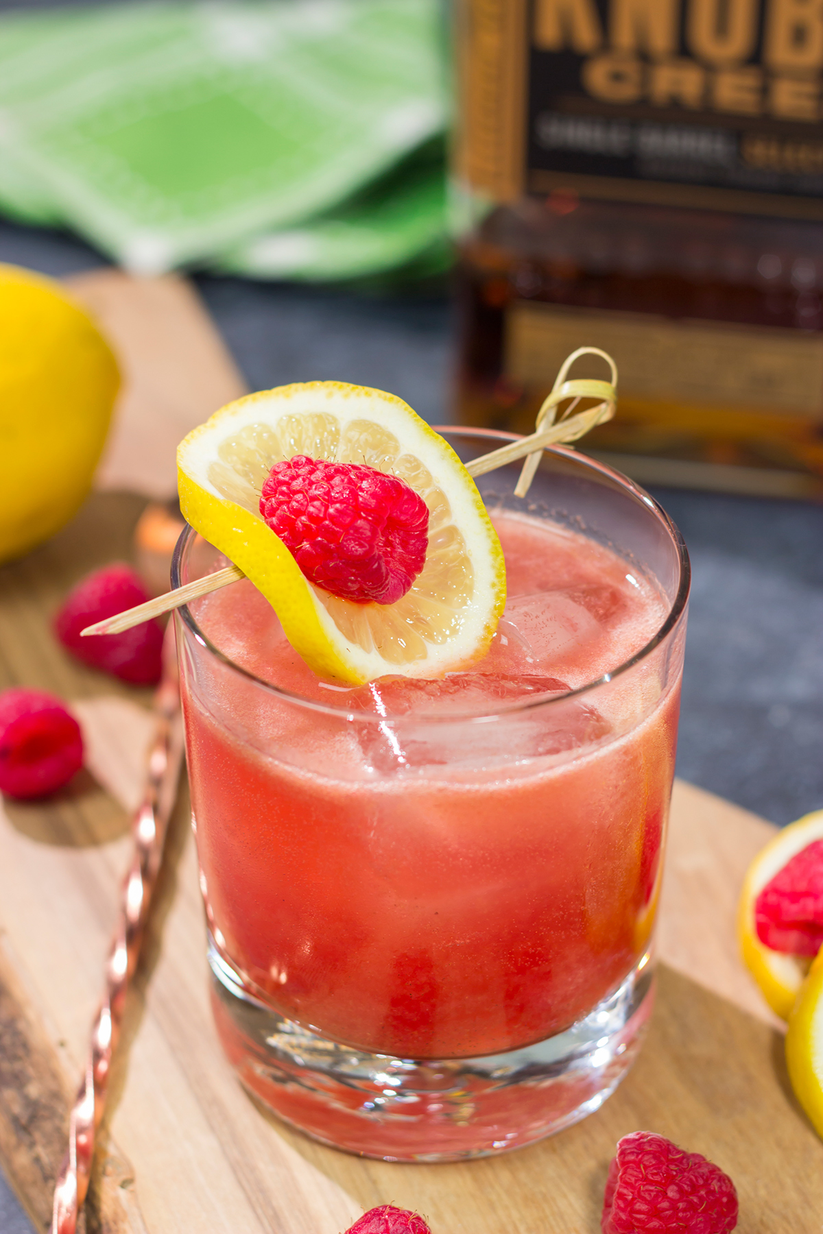 This Raspberry Bourbon Lemonade is a great summer cocktail! Made from fresh raspberries and real lemons, this whiskey cocktail is great for parties in the backyard. Cheers!