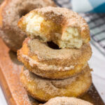 Craving a sweet treat? Make a batch of these Baked Cinnamon Sugar Doughnuts. Ready in less than 45 minutes, these doughnuts are always a family favorite!