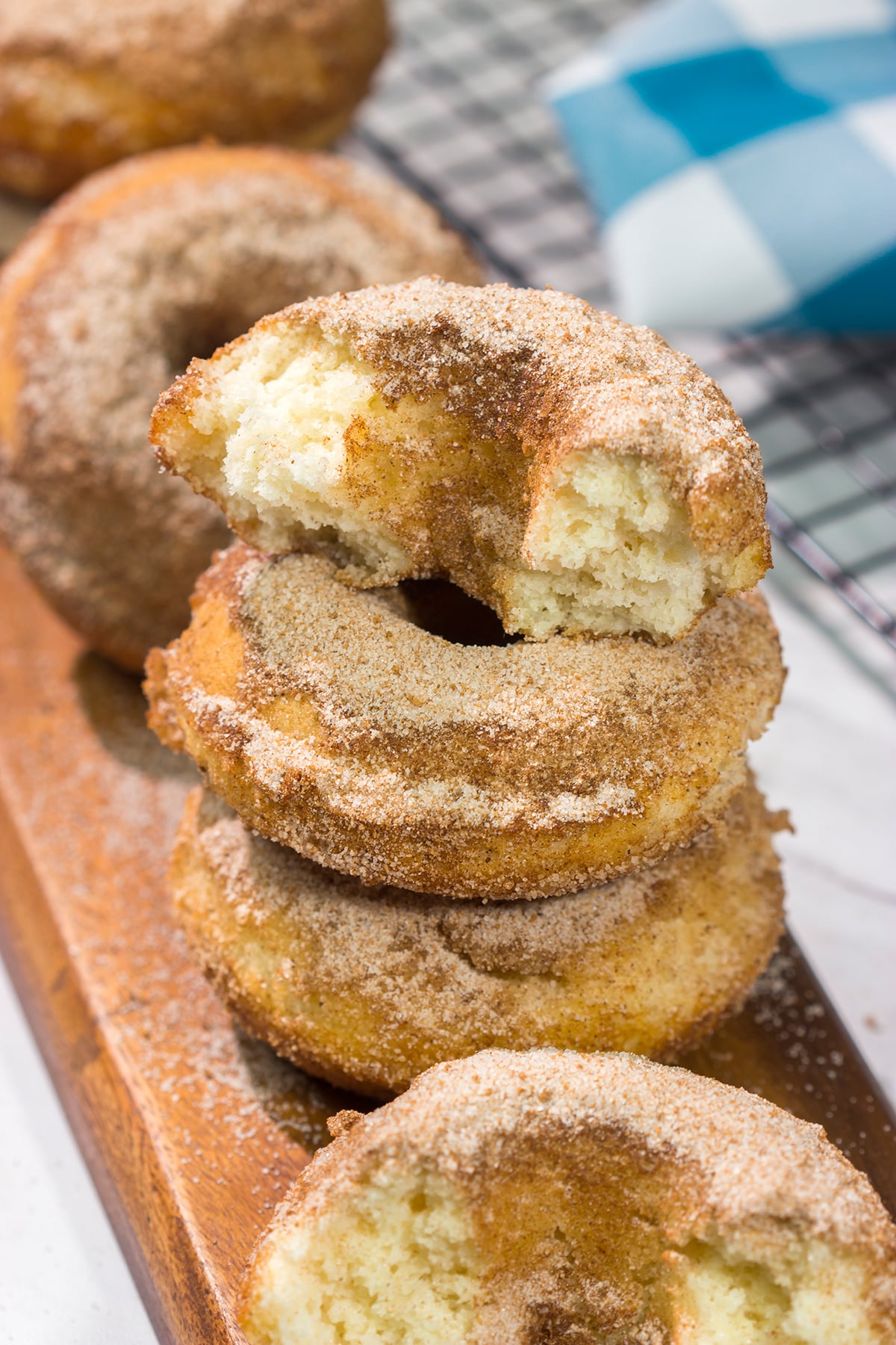 Craving a sweet treat? Make a batch of these Baked Cinnamon Sugar Doughnuts. Ready in less than 45 minutes, these doughnuts are always a family favorite!
