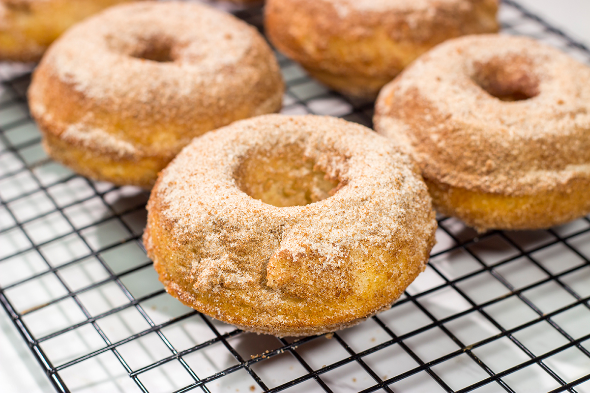 Craving a sweet treat? Make a batch of these Baked Cinnamon Sugar Doughnuts. Ready in less than 45 minutes, these doughnuts are always a family favorite!