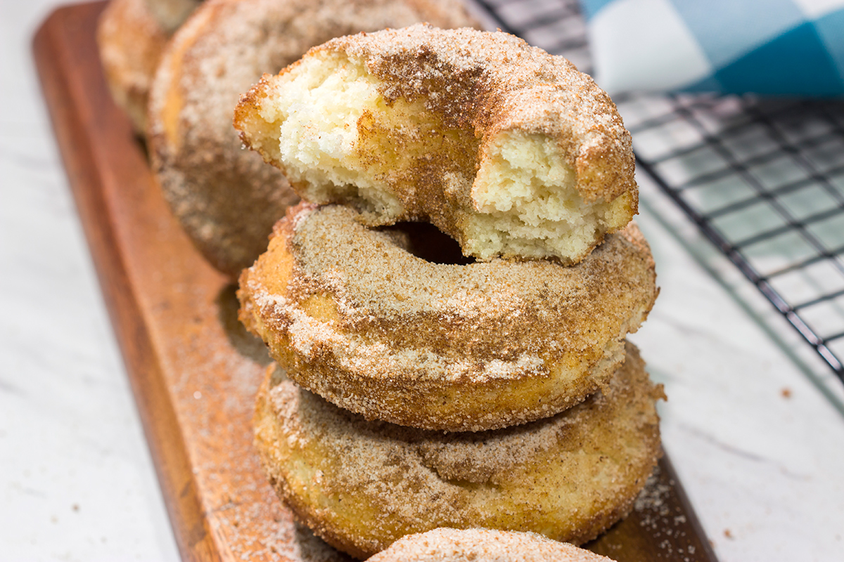 Craving a sweet treat? Make a batch of these Baked Cinnamon Sugar Doughnuts. Ready in less than 45 minutes, these doughnuts are always a family favorite!