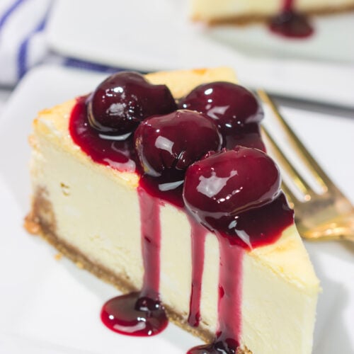 Featuring a creamy cheesecake base topping with an easy homemade cherry sauce, a slice of this Cherry Cheesecake makes for a delicious dessert. It's a classic for a reason!