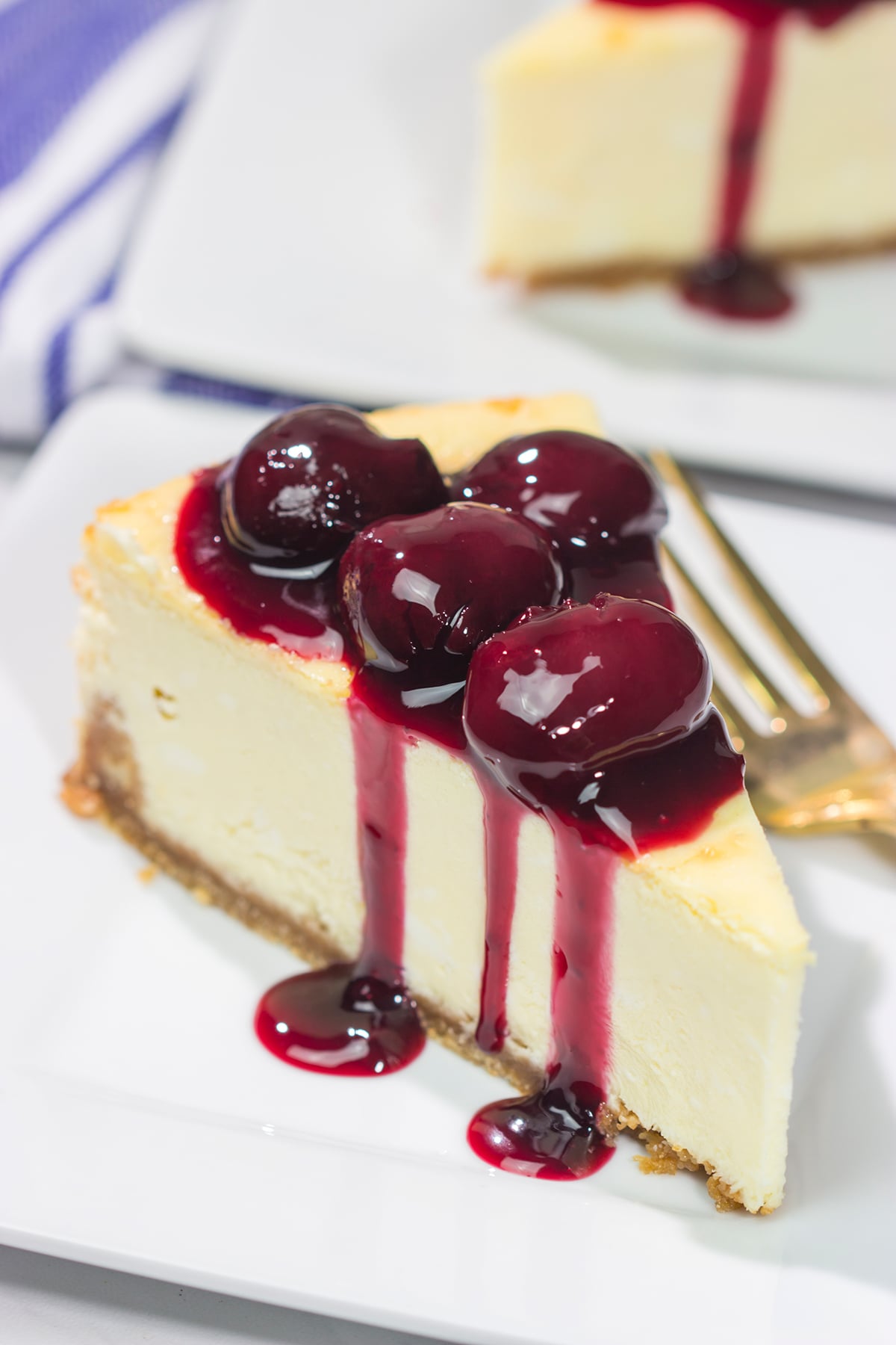 Featuring a creamy cheesecake base topping with an easy homemade cherry sauce, a slice of this Cherry Cheesecake makes for a delicious dessert. It's a classic for a reason!