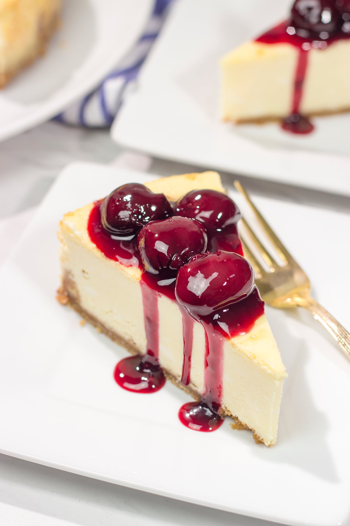 Featuring a creamy cheesecake base topping with an easy homemade cherry sauce, a slice of this Cherry Cheesecake makes for a delicious dessert. It's a classic for a reason!