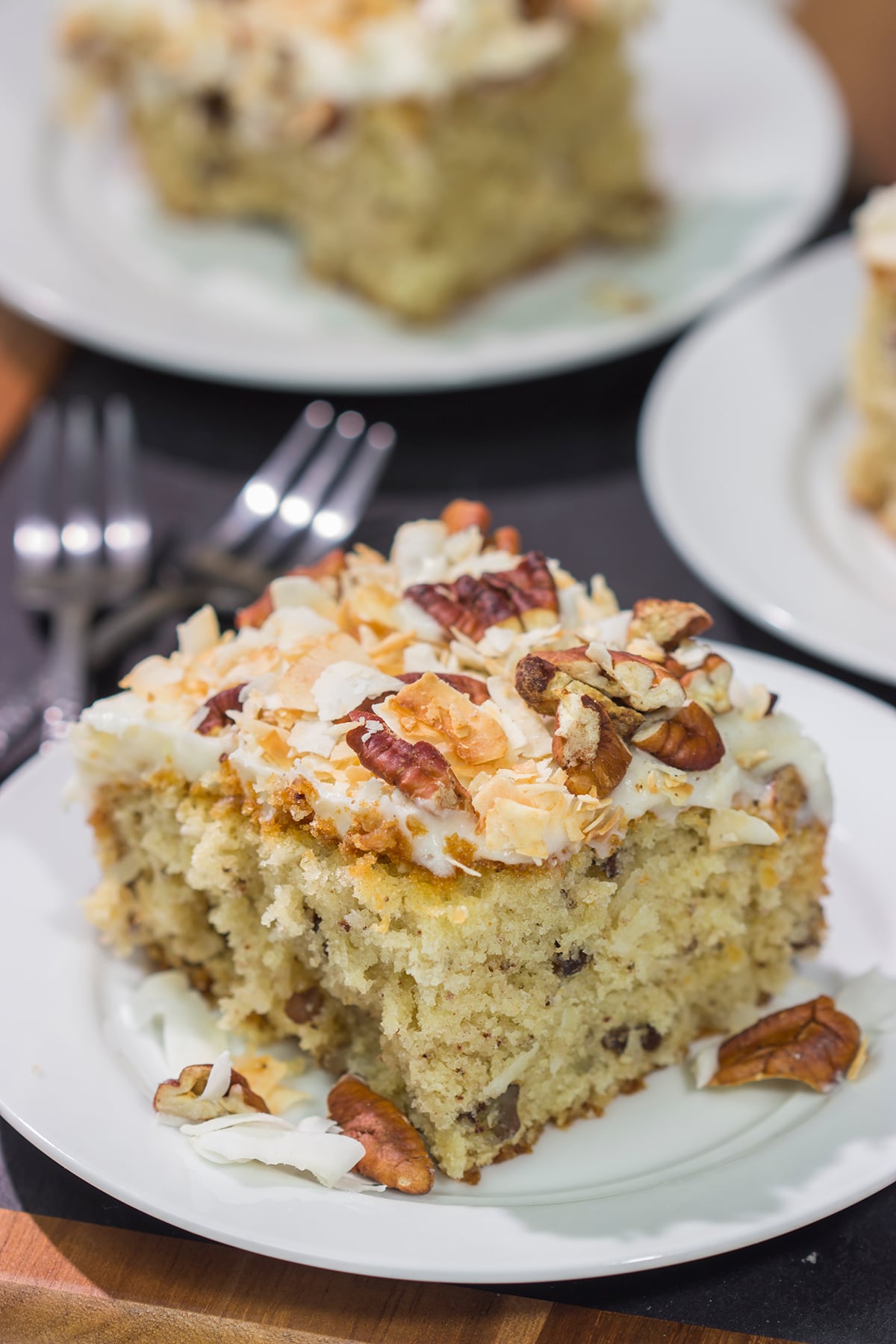 The combination of coconut and pecan flavors in this tender cake topped with cream cheese frosting is absolutely fantastic!  Add toasted pecans and coconut on top to make this Italian Cream Cake irresistible!