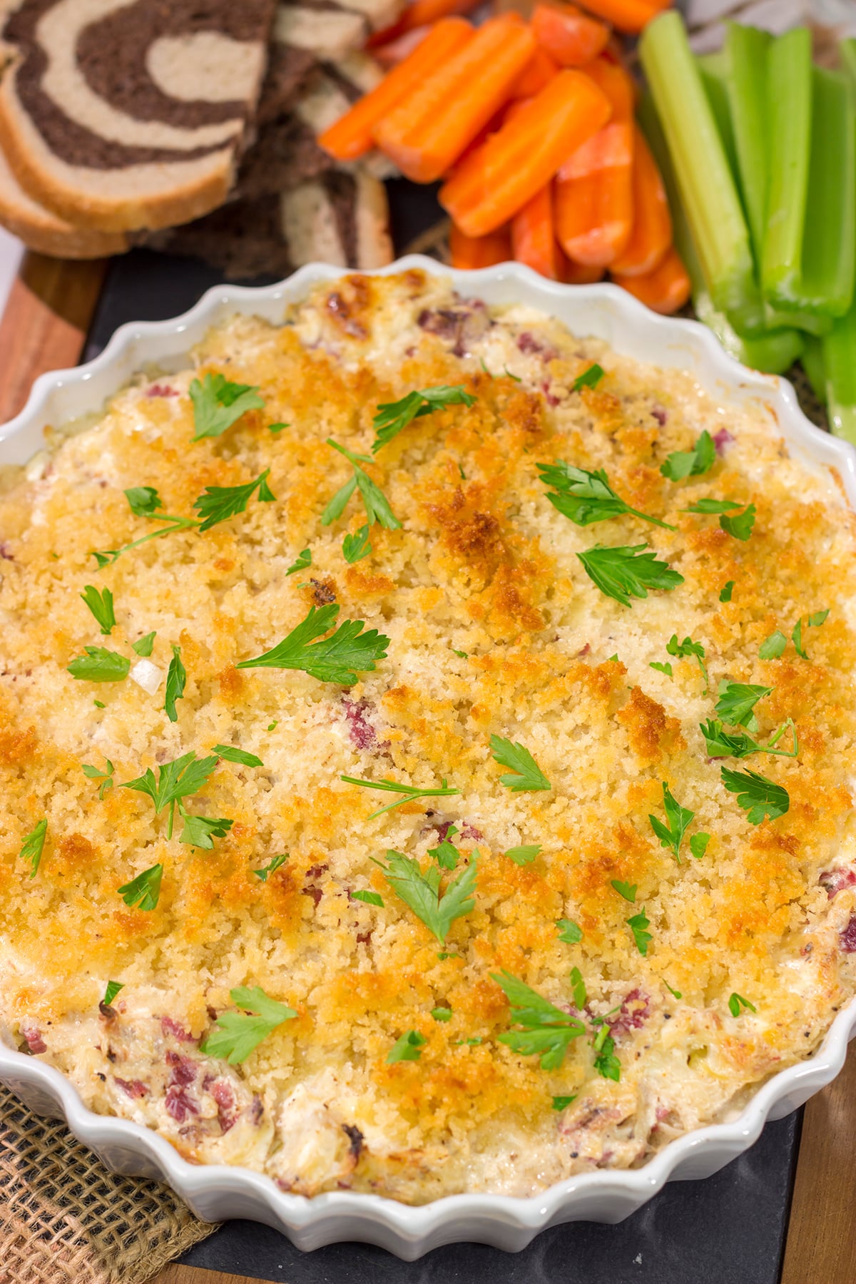 This Reuben Dip recipe features all of the flavors of the classic deli sandwich...in appetizer form. Grab some crackers and dig in!