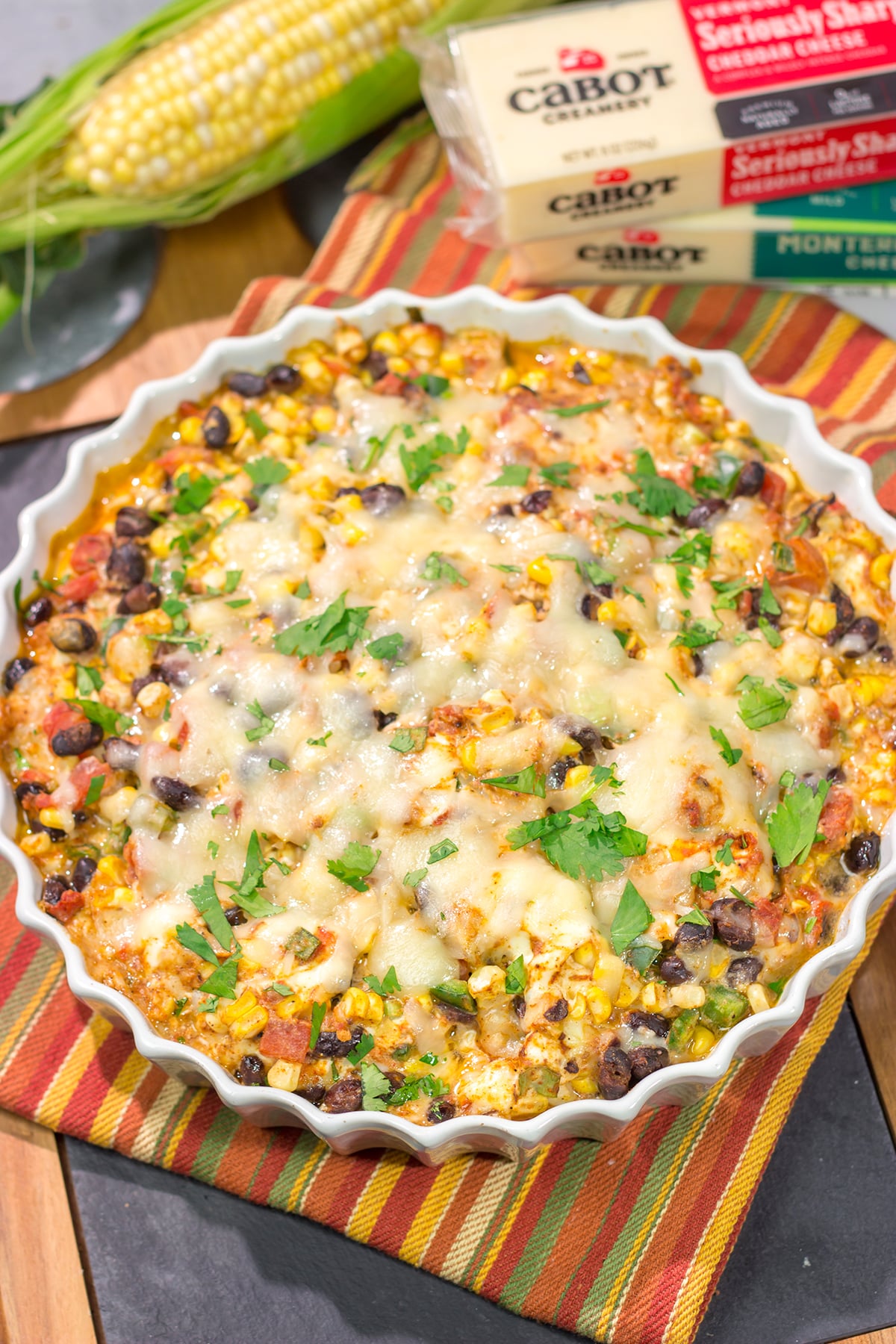 Featuring fresh corn combined with melty cheeses, this Black Bean and Corn Dip is a great party appetizer! Serve with tortilla chips, crackers or sliced veggies.