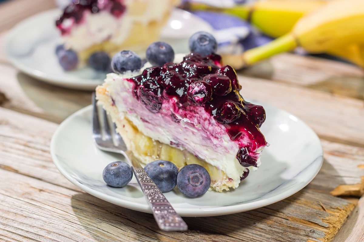 This creamy, chilled Blueberry Banana Cream Cheese Pie is an easy and delicious dessert for a hot summer day. It's a great recipe for backyard parties!