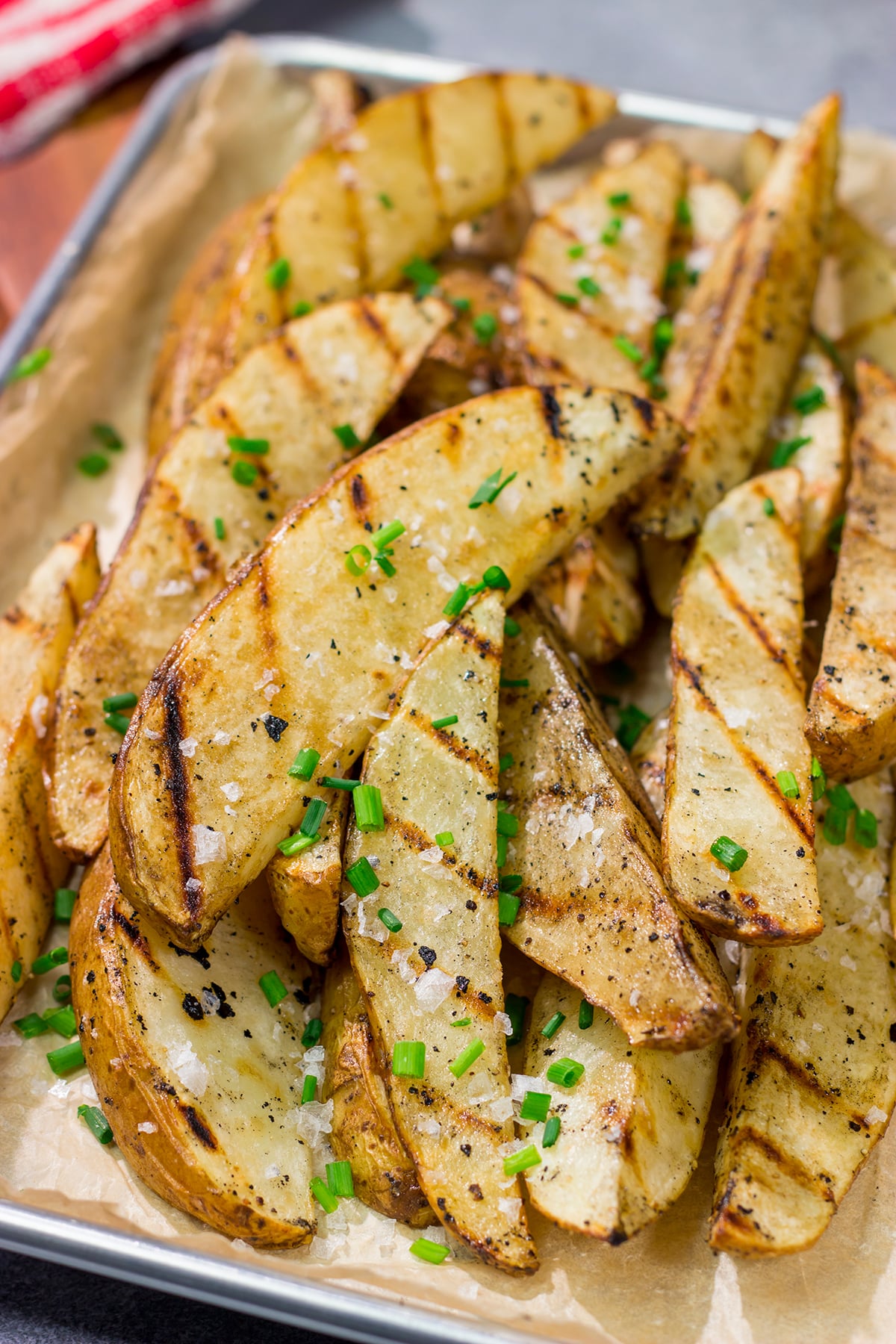 Put a salt and vinegar spin on grilled potato wedges with this Grilled Salt and Vinegar Potatoes recipe. This is a delicious side dish for summer grilling!