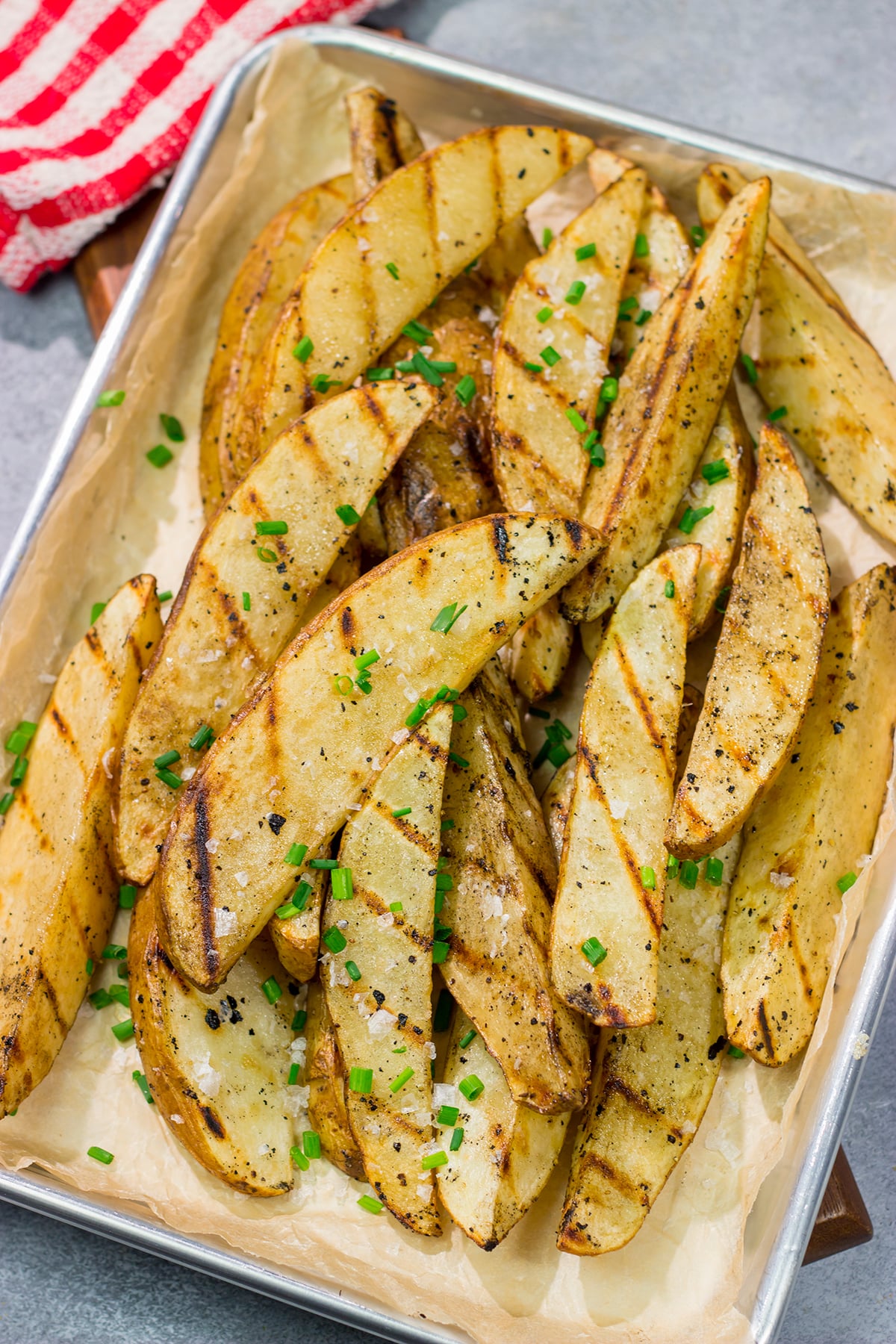 Put a salt and vinegar spin on grilled potato wedges with this Grilled Salt and Vinegar Potatoes recipe. This is a delicious side dish for summer grilling!