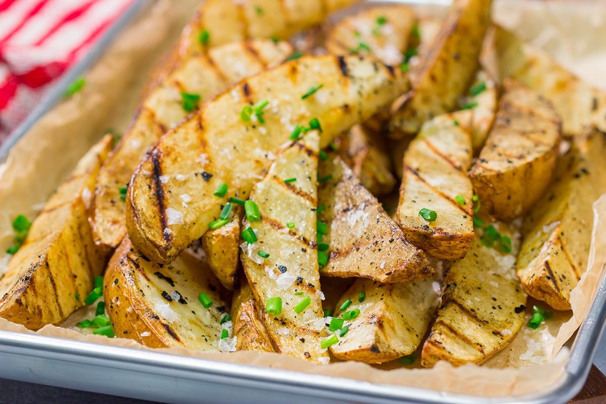 Put a salt and vinegar spin on grilled potato wedges with this Grilled Salt and Vinegar Potatoes recipe. This is a delicious side dish for summer grilling!