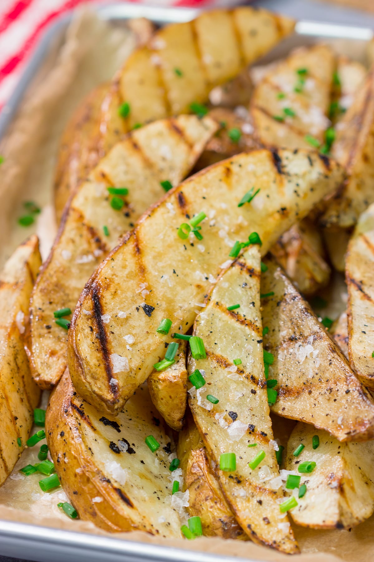Put a salt and vinegar spin on grilled potato wedges with this Grilled Salt and Vinegar Potatoes recipe. This is a delicious side dish for summer grilling!