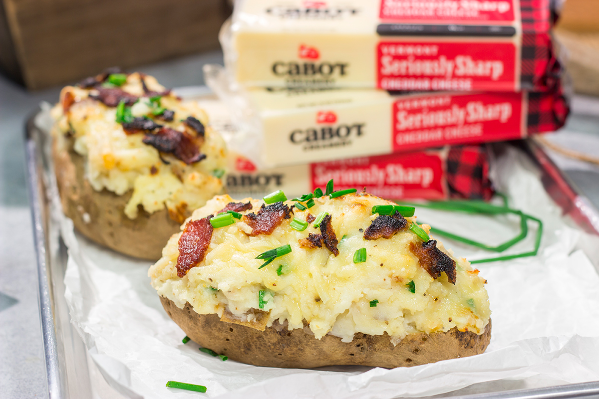 These Grilled Twice-Baked Potatoes feature crispy potato skins filled with creamy mashed potatoes combined with all of your favorite toppings. Add in the grill flavor and you've got one heck of a recipe!