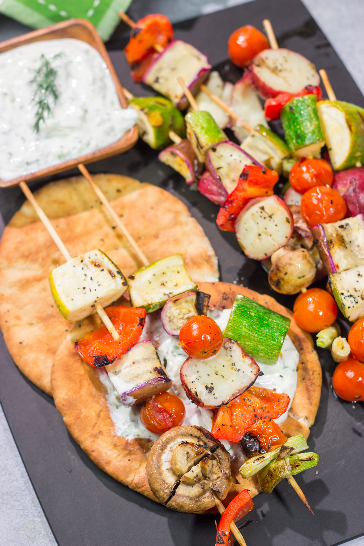 Take advantage of fresh summer produce with this Grilled Vegetable Souvlaki recipe. Serve with grilled pita and homemade tzatziki sauce for an extra boost of flavor!