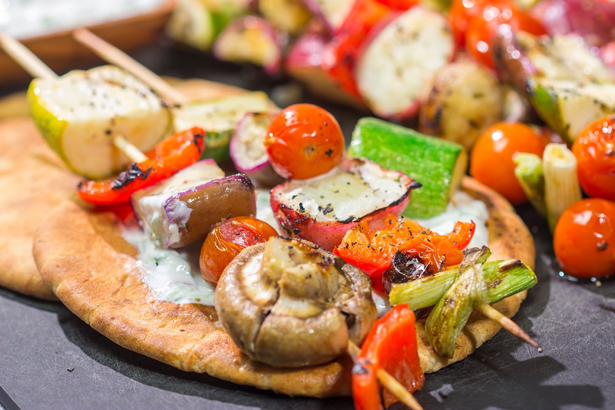 Take advantage of fresh summer produce with this Grilled Vegetable Souvlaki recipe. Serve with grilled pita and homemade tzatziki sauce for an extra boost of flavor!