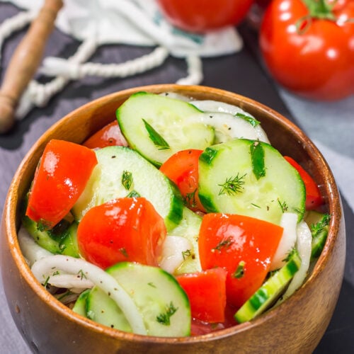 This easy Tomato, Cucumber and Onion Salad is a delicious summer recipe! This versatile side dish pairs well with almost anything.