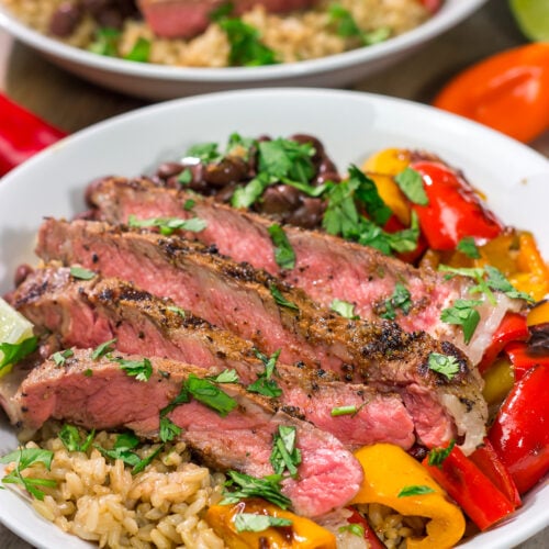 These Grilled Steak Burrito Bowls are packed with summer flavor, but they're easy enough to make on a weeknight. Happy Grilling!