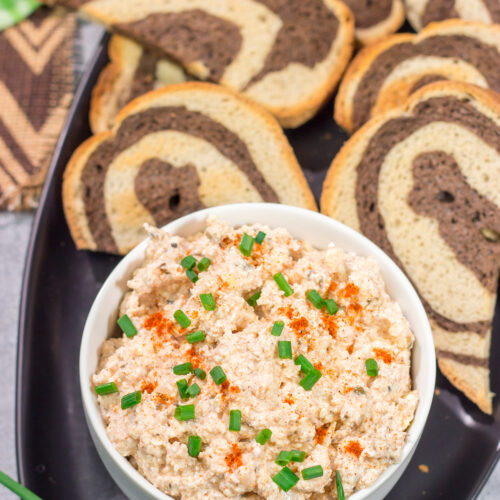 Liptauer is a tasty paprika-infused cheese spread popular throughout Austria, Hungary and Slovakia. This easy recipe is a great addition to an appetizer board!