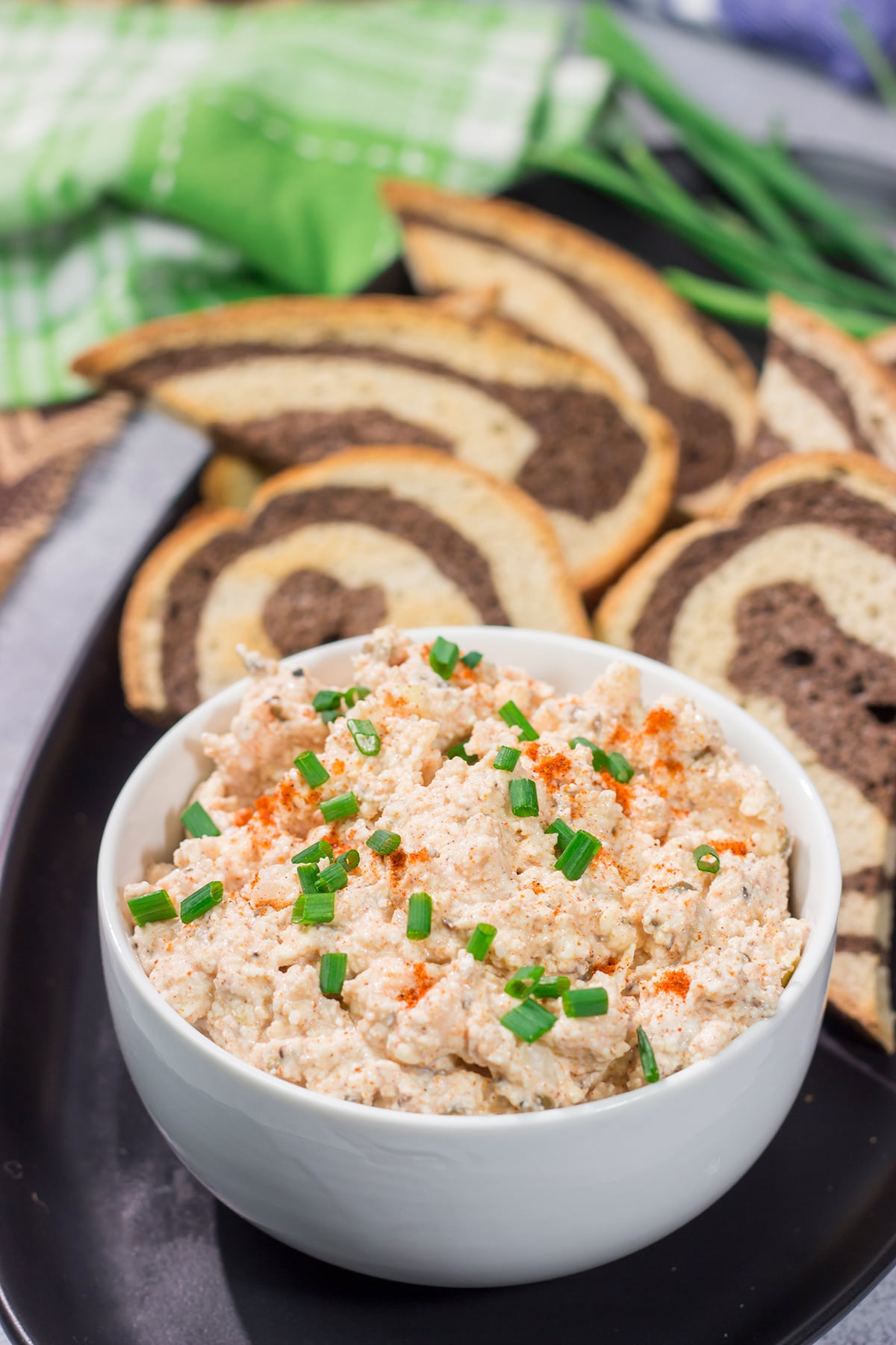 Liptauer is a tasty paprika-infused cheese spread popular throughout Austria, Hungary and Slovakia. This easy recipe is a great addition to an appetizer board!