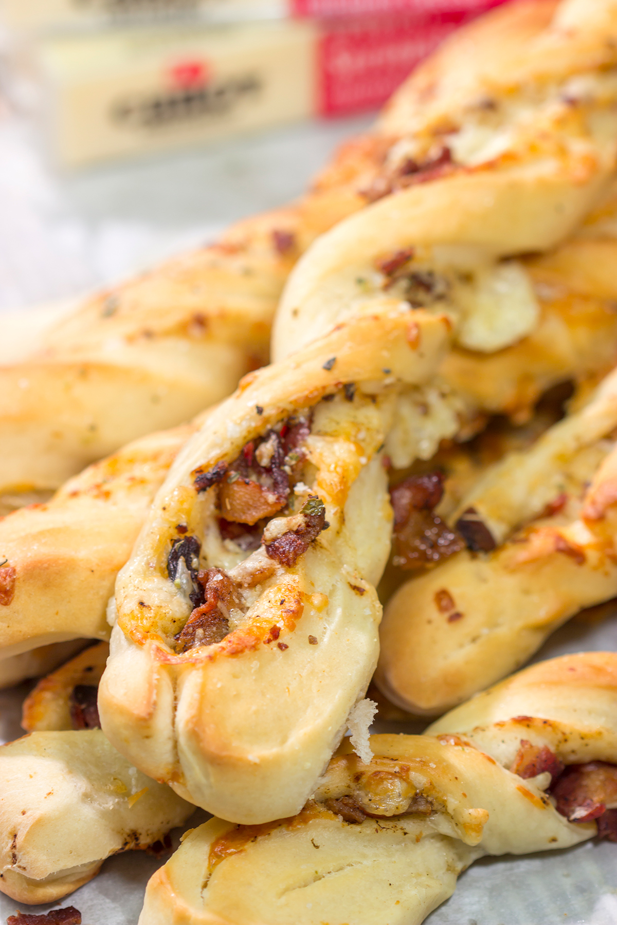 These Cheesy Bacon Breadsticks are proof that bacon and cheese make everything better! These breadsticks are great served as an appetizer or side dish. Enjoy!