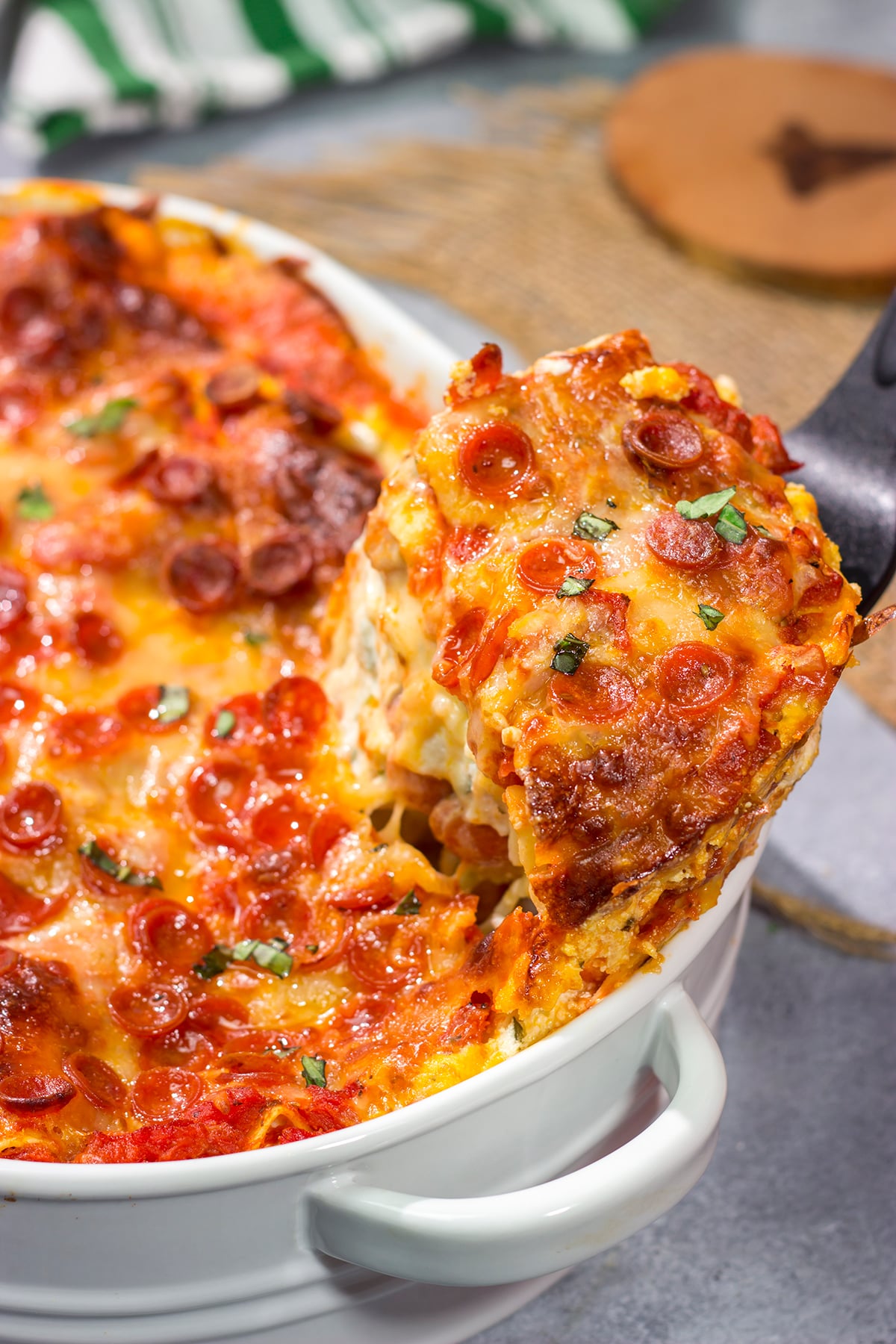 Pizza or lasagna? Why not go for both in this fun mash-up of two favorite comfort foods? This Pepperoni Pizza Lasagna is sure to be a family favorite!