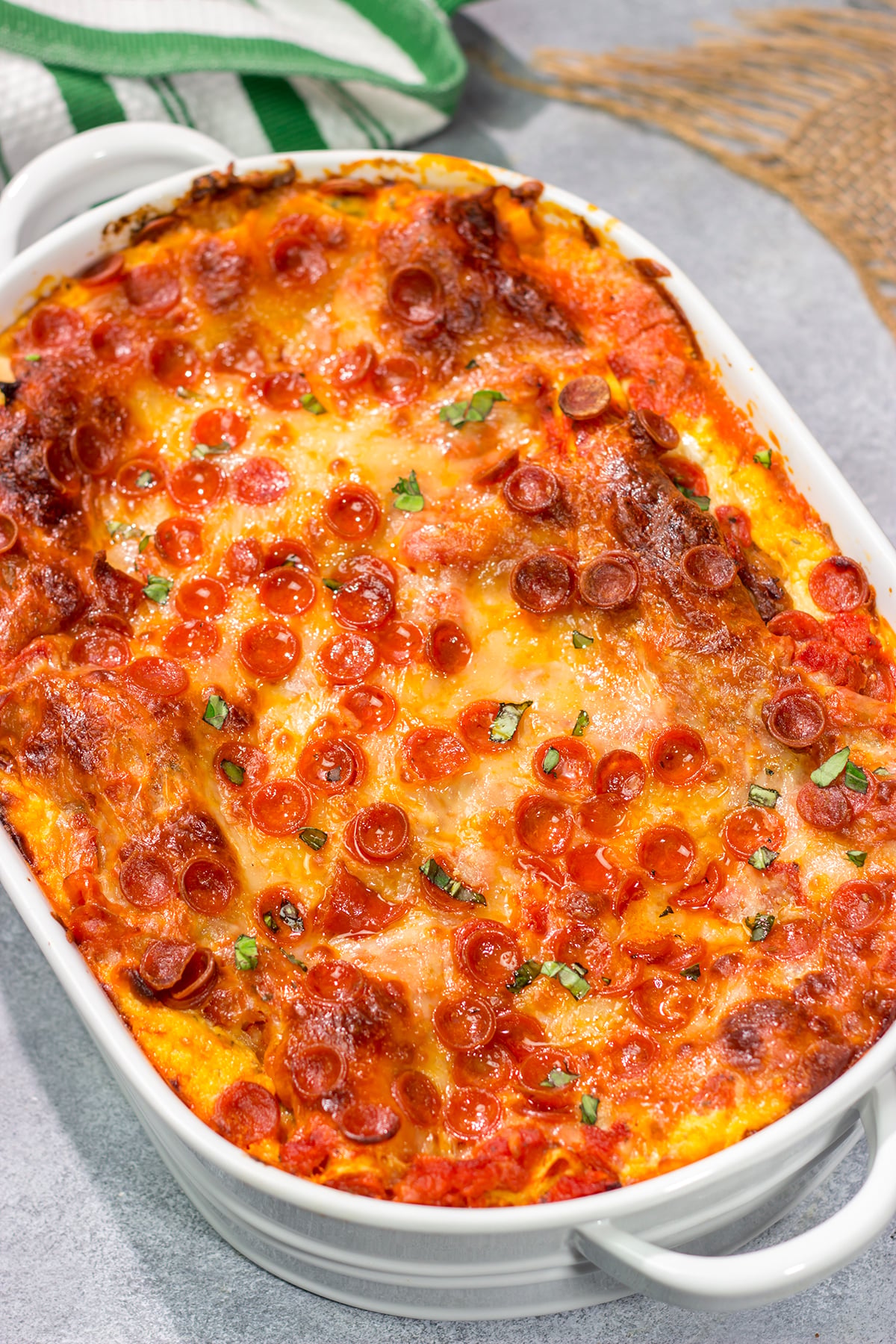 Pizza or lasagna? Why not go for both in this fun mash-up of two favorite comfort foods? This Pepperoni Pizza Lasagna is sure to be a family favorite!
