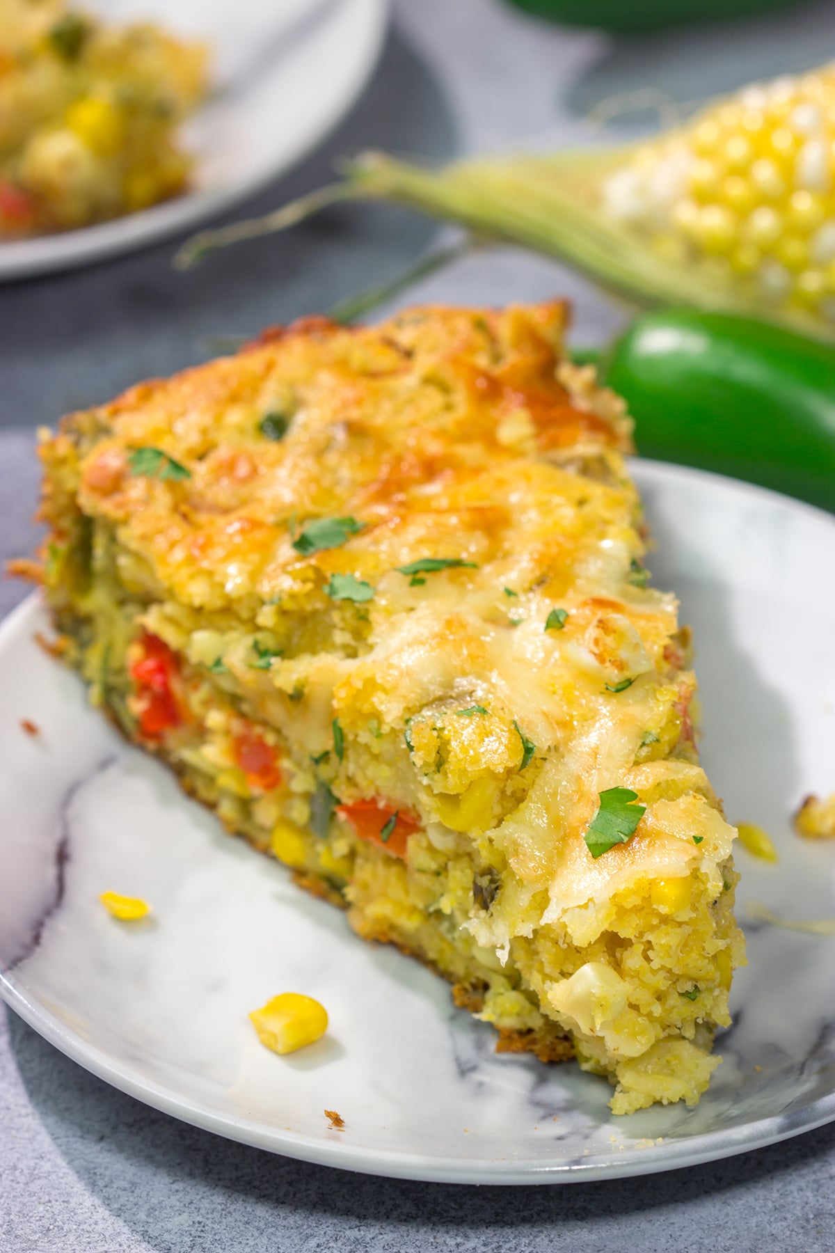 This easy Southwestern Cheesy Cornbread is packed with flavor! This tender cornbread is infused with bold Southwestern flavors - it's the perfect side dish for dinner tonight!