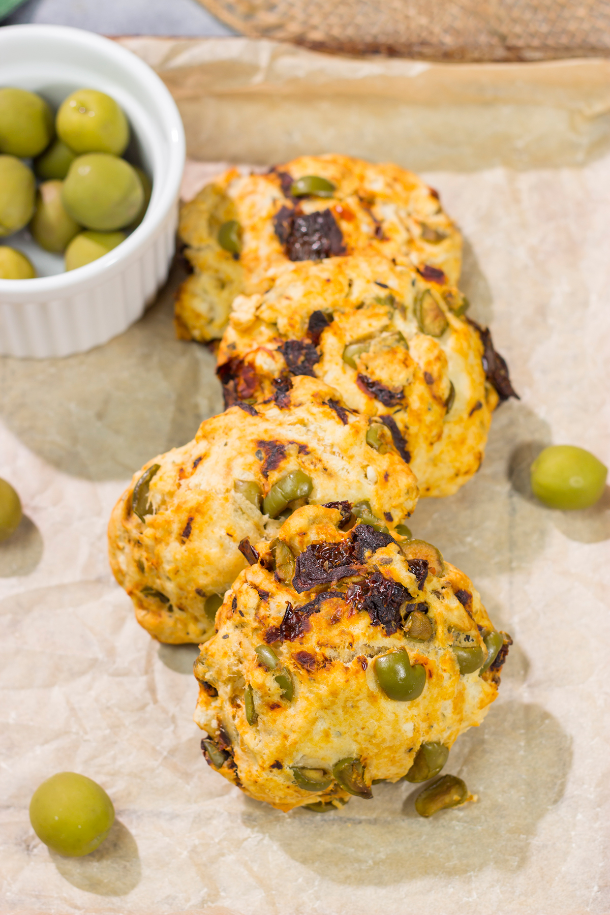 Put a savory spin on an old favorite! These Sundried Tomato and Olive Muffin Tops are packed with flavor. They're great next to a salad or a bowl of soup!