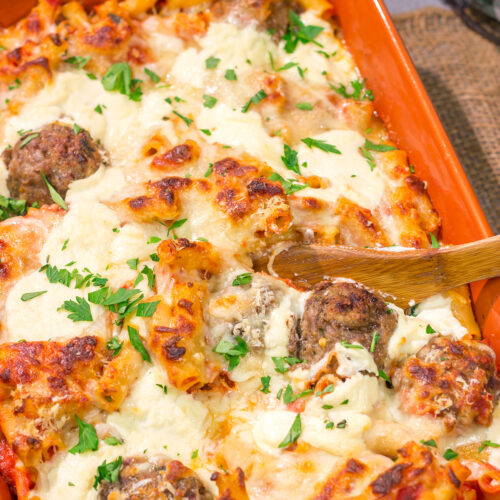 This Baked Ziti with Meatballs recipe is the ultimate comfort food. Pasta, gooey melted cheese and meatballs combine to create a delicious casserole!